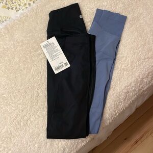 2 pairs of Lululemon breezethrough high-rise tights 25"